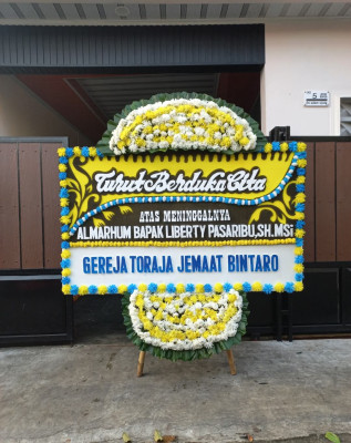 Papan Bunga Duka di Logas Tanah Darat